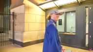 Dyl walking around inside the stadium